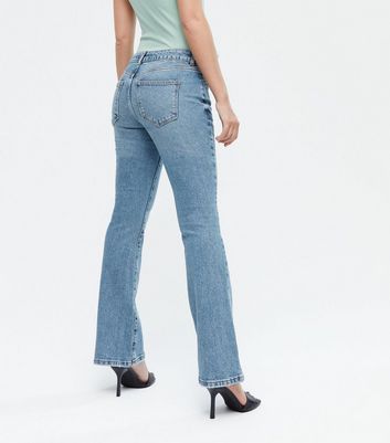 Click to view product details and reviews for Petite Blue Low Rise Flared Brooke Jeans New Look.