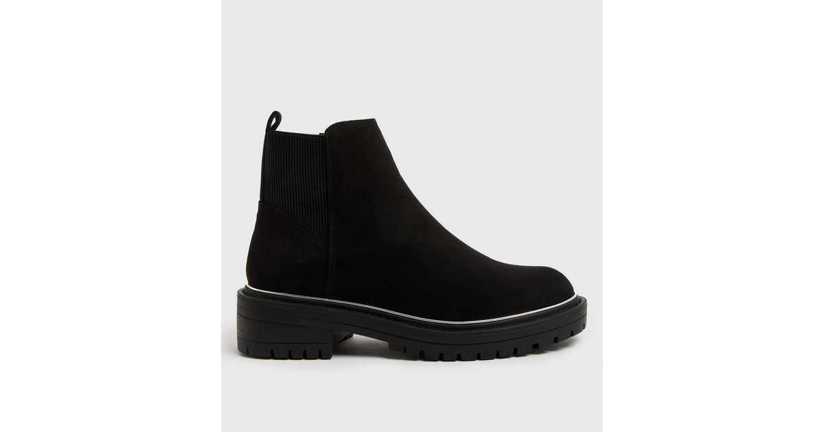 black metal trim chelsea boots