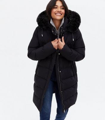 Click to view product details and reviews for Blue Vanilla Black Midi Puffer Jacket New Look.