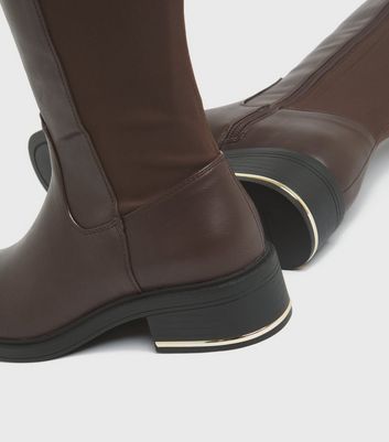 tall boots with stretch back