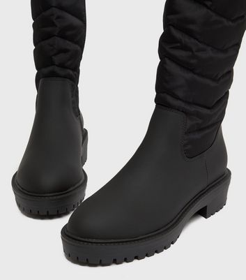 black quilted boots