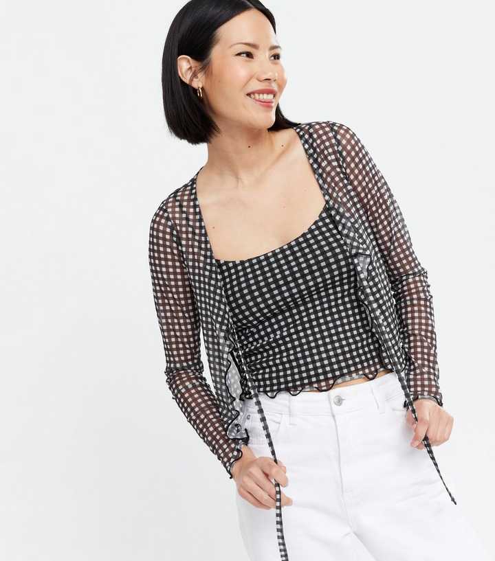 https://media3.newlookassets.com/i/newlook/692770209/womens/clothing/knitwear/black-gingham-mesh-cami-and-cardigan-set.jpg?strip=true&qlt=50&w=720