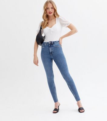 Frayed hem high sale waisted skinny jeans