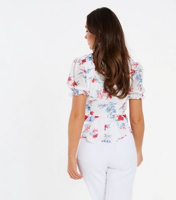 Click to view product details and reviews for Quiz White Floral Chiffon Tie Front Peplum Top New Look.