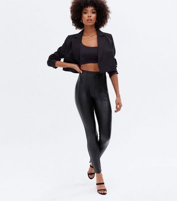 New Look split front leather look legging in black - ShopStyle