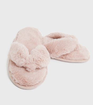 Pink fluffy flip store flops