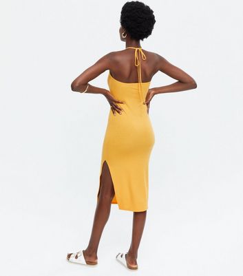 yellow form fitting dress