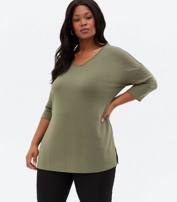 Click to view product details and reviews for Curves Khaki Fine Knit V Neck Step Hem Top New Look.