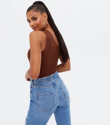 brown one shoulder bodysuit