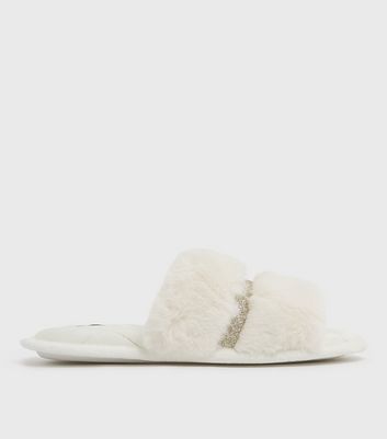 white faux fur slides