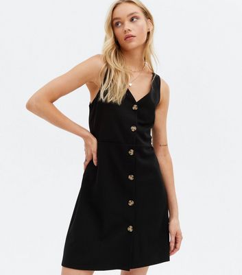 Black button shop pinafore dress