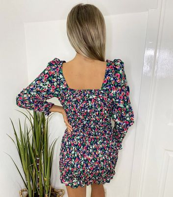 Click to view product details and reviews for Ax Paris Navy Ditsy Floral Shirred Bodycon Dress New Look.