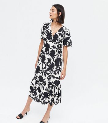 Click to view product details and reviews for White Floral Wrap Belted Tiered Midi Dress New Look.