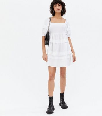 Click to view product details and reviews for White Poplin Tiered Mini Oversized Smock Dress New Look.