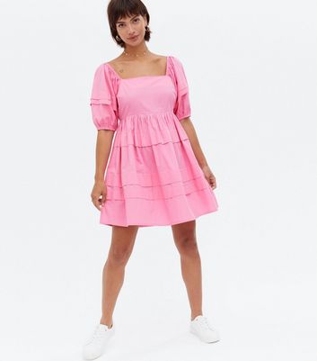 Click to view product details and reviews for Bright Pink Poplin Tiered Mini Oversized Smock Dress New Look.