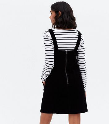 Click to view product details and reviews for Maternity Black Cord Mini Pinafore Dress New Look.