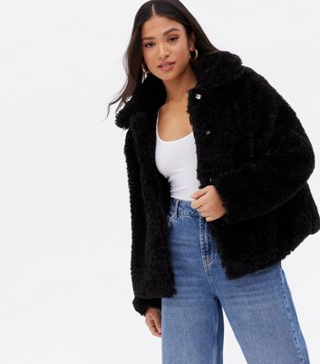 Click to view product details and reviews for Petite Black Faux Fur Collared Coat New Look.