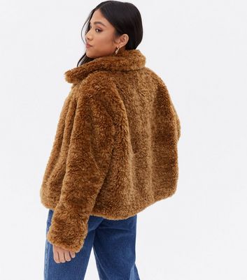 Click to view product details and reviews for Petite Tan Faux Fur Collared Coat New Look.