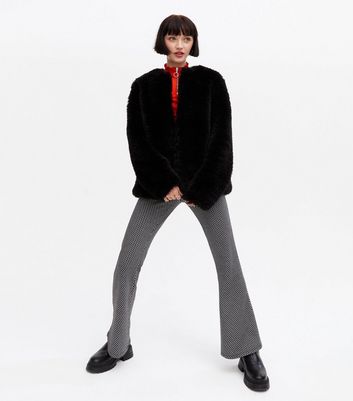 Click to view product details and reviews for Black Faux Fur Oversized Coat New Look.