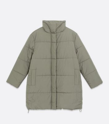 green puffer long coat