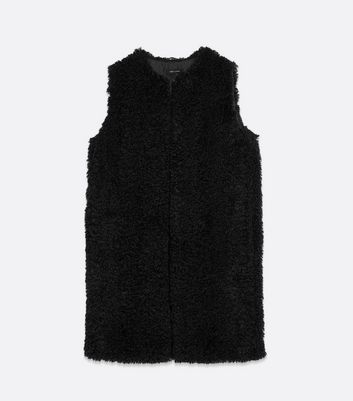 black shaggy vest