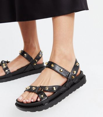 black studded flatforms