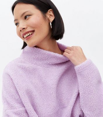 Click to view product details and reviews for Only Lilac Teddy High Neck Drawstring Sweatshirt New Look.