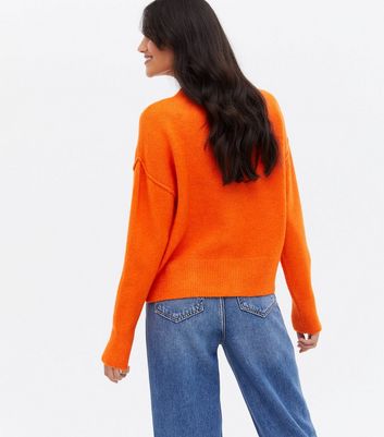 orange pullover sweater