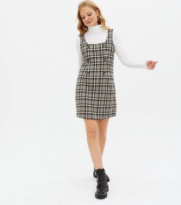 black checkered pinafore dress