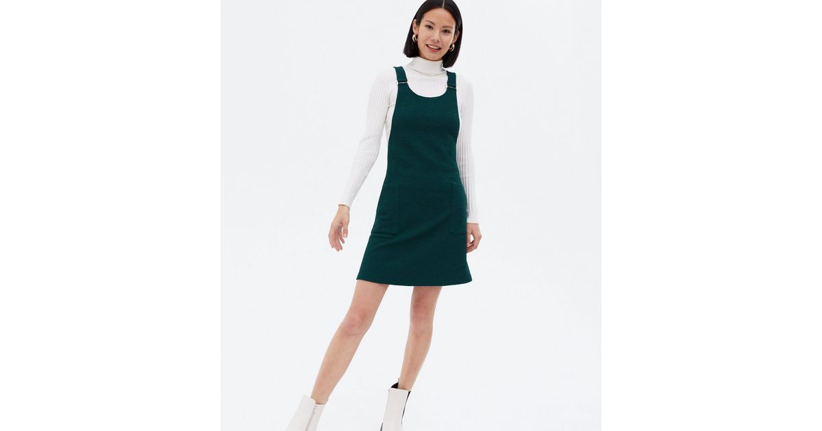 dark green pinafore
