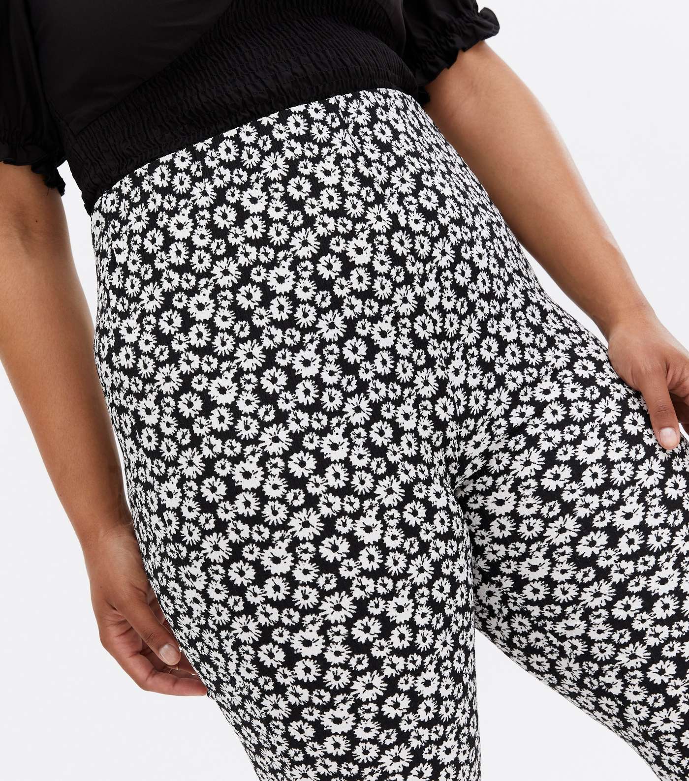 Curves Black Ditsy Floral Flared Trousers Image 3