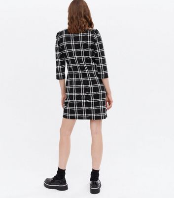 black mini shift dress