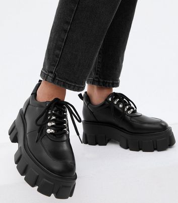 truffle collection chunky lace up boots in black