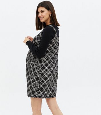 Click to view product details and reviews for Maternity Black Check Square Neck Pinafore Dress New Look.