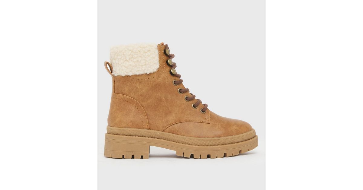 tan faux shearling lace up chunky boots