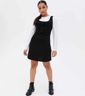 Click to view product details and reviews for Petite Black Button Front Mini Pinafore Dress New Look.