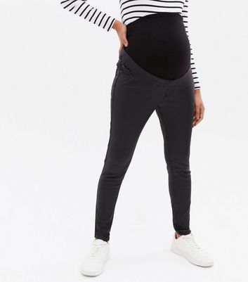 Click to view product details and reviews for Maternity Black Coated Lift Shape Over Bump Emilee Jeggings New Look.