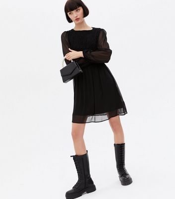 Click to view product details and reviews for Black Chiffon Shirred Mini Smock Dress New Look.