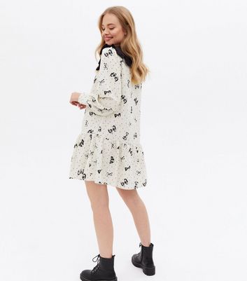 Click to view product details and reviews for Off White Bow Spot Frill Collar Mini Oversized Smock Dress New Look.