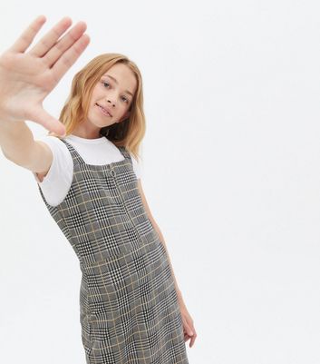 girls black pinafore dress