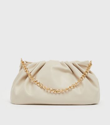 Cream and gold online clutch bag