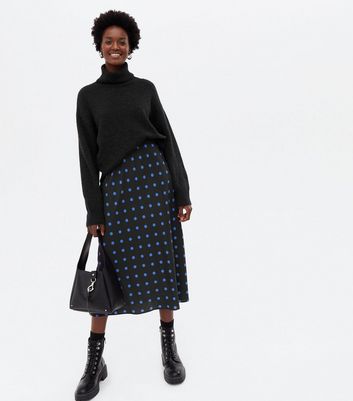 black spotted midi skirt