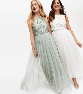 Click to view product details and reviews for Maya Light Green Sequin Halter Maxi Dress New Look.