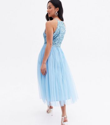 Click to view product details and reviews for Maya Petite Pale Blue Sequin Halter Midi Dress New Look.