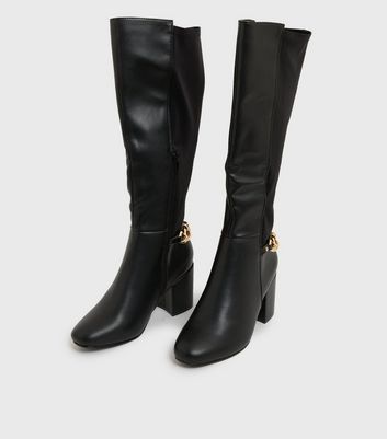 knee high fitted boots