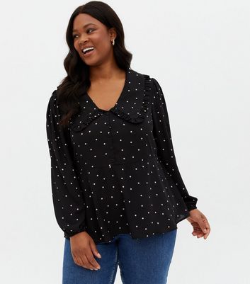 white blouse with black dots