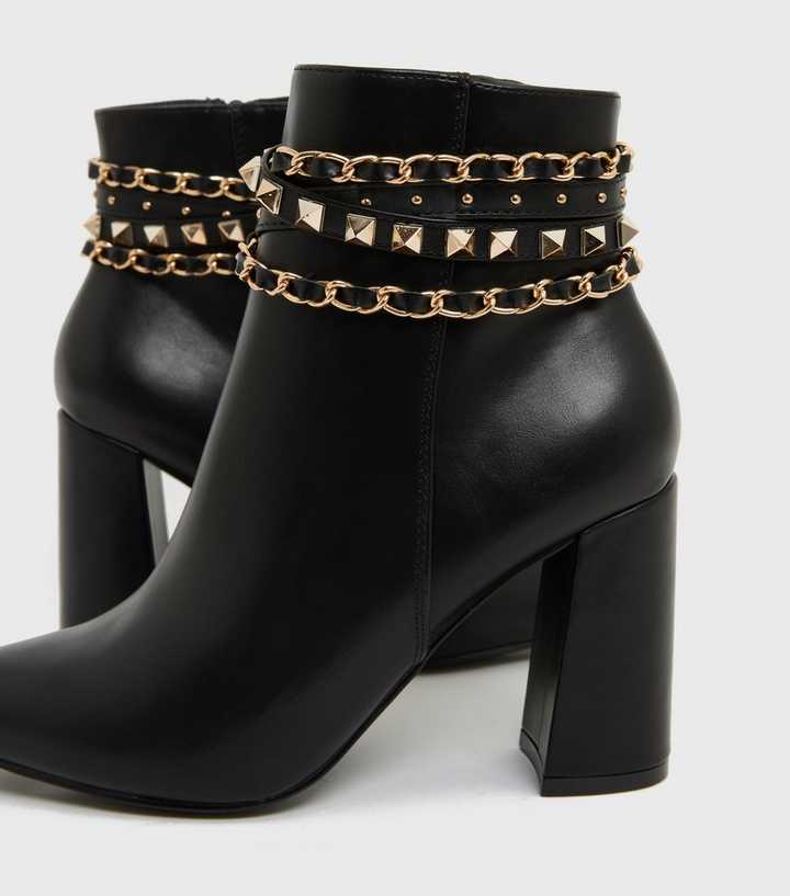black ankle boots with chains