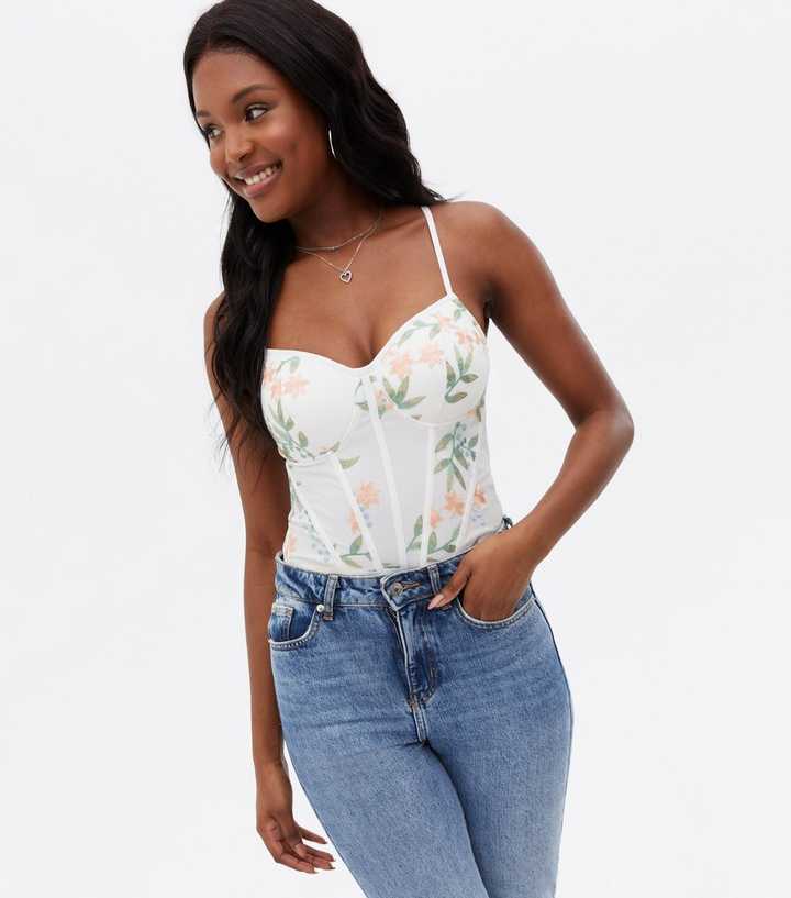 https://media3.newlookassets.com/i/newlook/808042219/womens/clothing/tops/white-floral-embroidered-mesh-bustier-bodysuit.jpg?strip=true&qlt=50&w=720