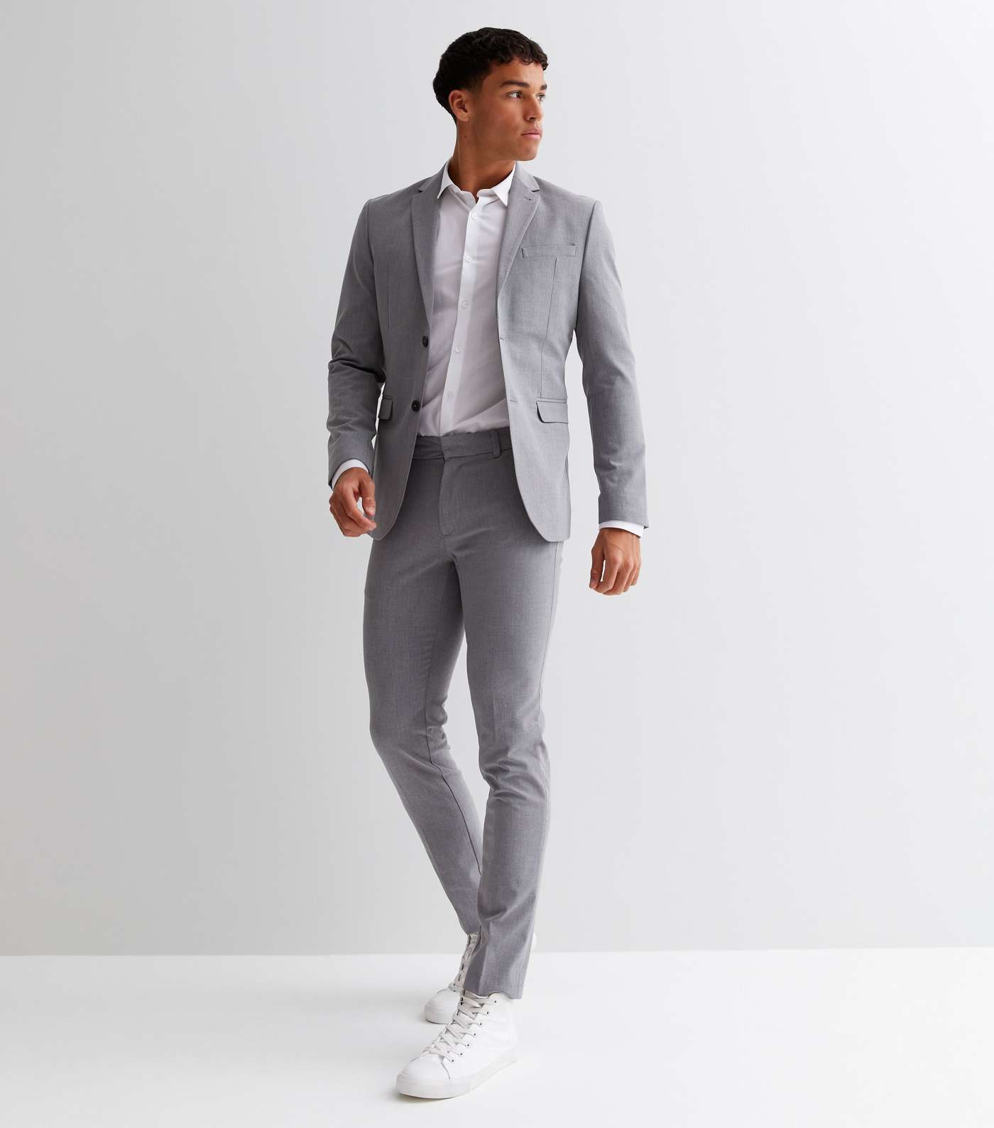 https://media3.newlookassets.com/i/newlook/808227007/mens/clothing/trousers/grey-marl-skinny-suit-trousers.jpg?strip=true&w=1400&qlt=60&fmt=jpeg