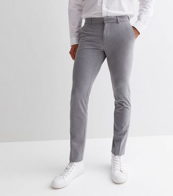 Grey super skinny fit check print trousers | River Island